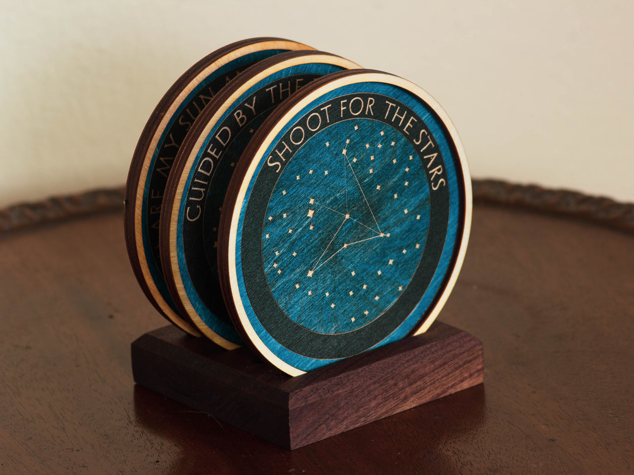 Personalized constellation wooden coasters.