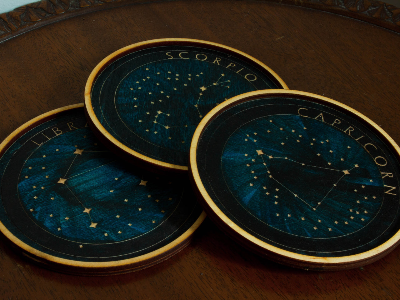 Personalized constellation wooden coasters.