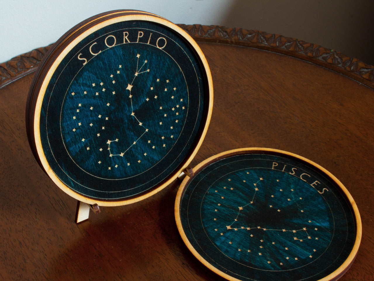 Personalized constellation wooden coasters.